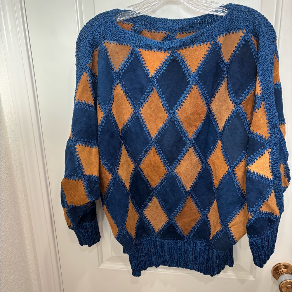 Gently used Vintage crocheted and leather and suede patchwork top.